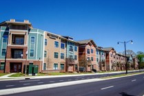 Riverfront-Village-Apartments-Near-University-of-Alabama-Building-Exterior-Street-View