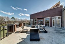 Riverfront-Village-Apartments-Near-University-of-Alabama-Clubhouse-Outdoor-Seating