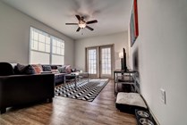 Riverfront-Village-Apartments-Near-University-of-Alabama-Furnished-Open-Living-Room