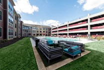 Riverfront-Village-Apartments-Near-University-of-Alabama-Pool-Lounge-Seating-Couches