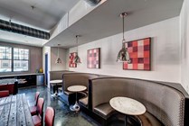 Riverfront-Village-Apartments-Near-University-of-Alabama-Resident-Clubhouse-Booth-Seating