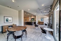 Riverfront-Village-Apartments-Near-University-of-Alabama-Resident-Clubhouse-Indoor-Outdoor-Seating